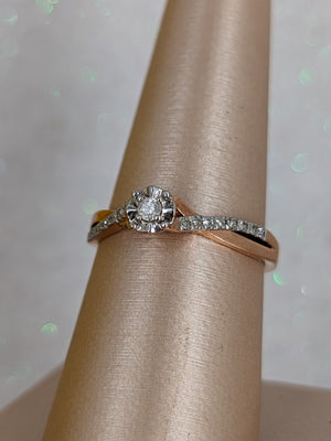 10k Rg size 7.5 solitaire plus style dia ring appx .30ctw