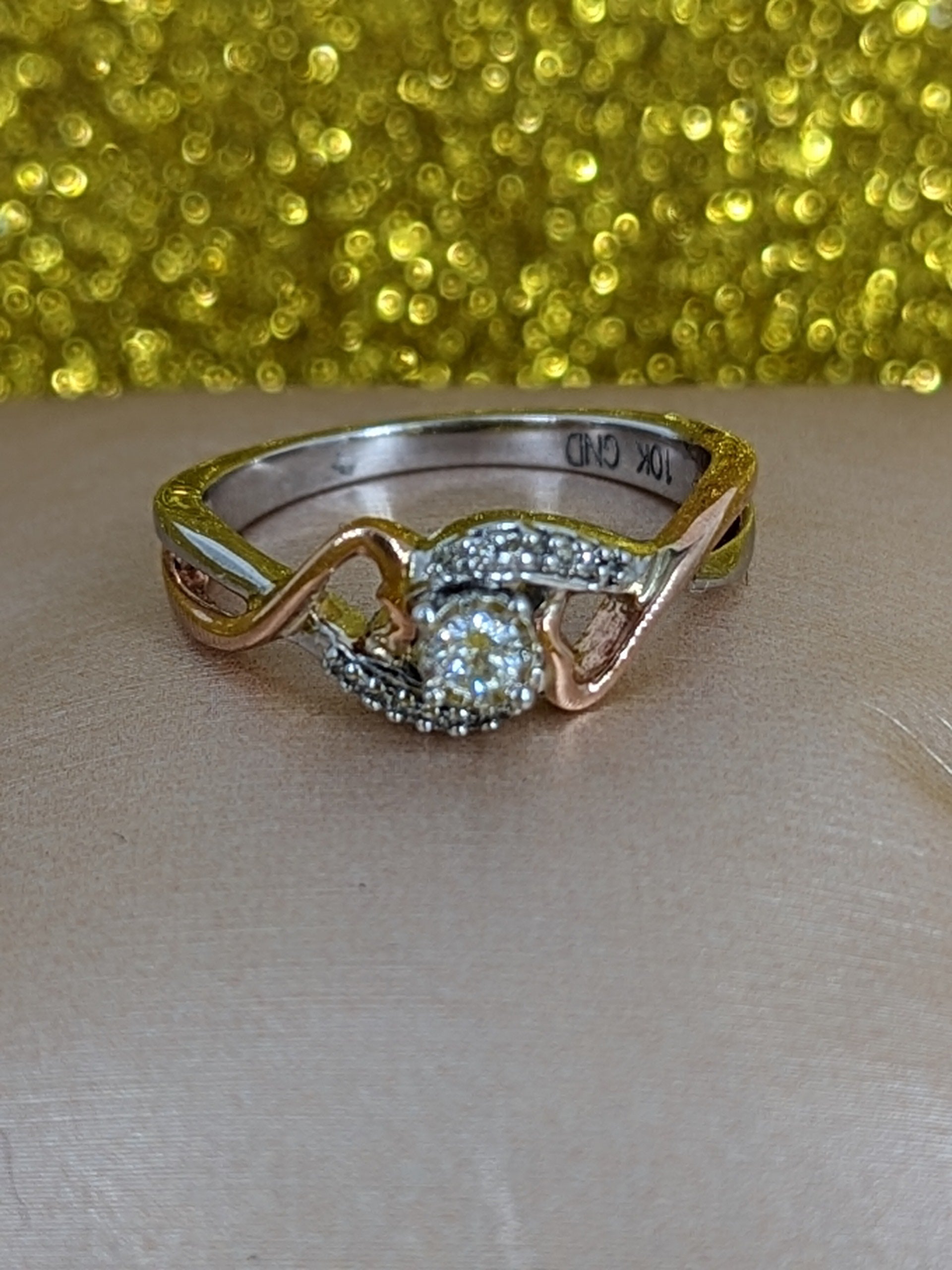 10k tt gold size 6.5 round dia ring appx .13ctw